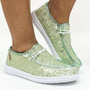 Light green glitter kayaks NIB Size 6,7,8,9 And 10